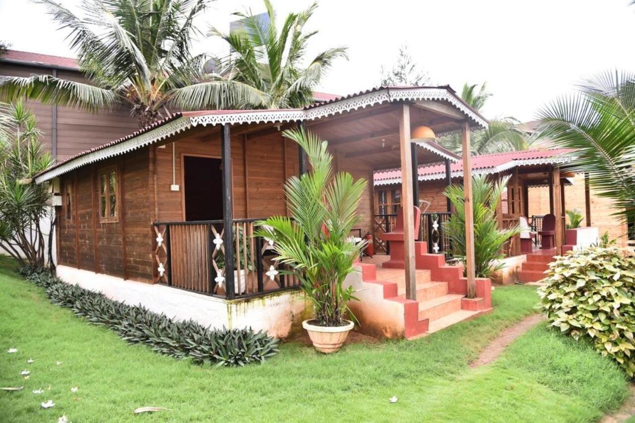 Paes Pearl Beach Villa Baga Exterior foto